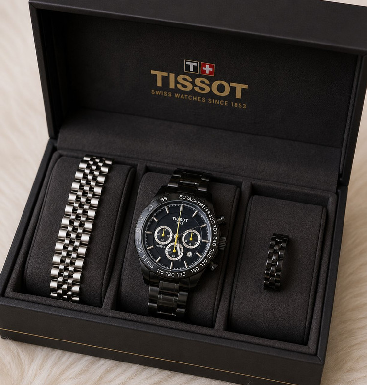 TISSOT prs516 سه موتور کرنوگراف موتور ژاپن دارای روز شمار قفل استیل پروانه ای (مخفی) بند استیل رنگ ثابت موتورکوارتز کرنو ضدآب قاب طلایی