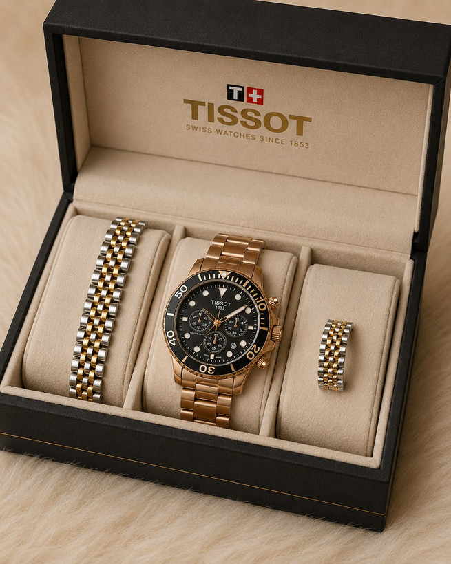 TISSOT prs516 سه موتور کرنوگراف موتور ژاپن دارای روز شمار قفل استیل پروانه ای (مخفی) بند استیل رنگ ثابت موتورکوارتز کرنو ضدآب قاب طلایی