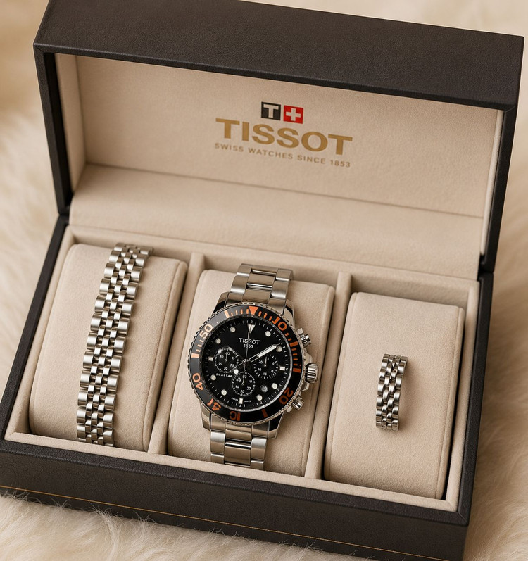 TISSOT prs516 سه موتور کرنوگراف موتور ژاپن دارای روز شمار قفل استیل پروانه ای (مخفی) بند استیل رنگ ثابت موتورکوارتز کرنو ضدآب قاب طلایی