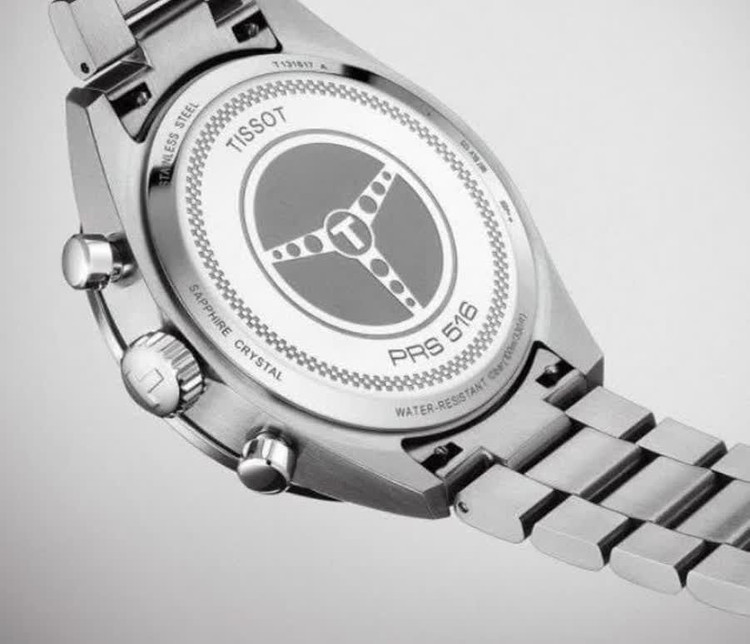 TISSOT prs516 سه موتور کرنوگراف موتور ژاپن دارای روز شمار قفل استیل پروانه ای (مخفی) بند استیل رنگ ثابت موتورکوارتز کرنو ضدآب قاب طلایی کرنوگراف