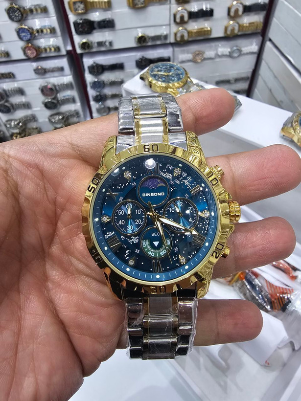 ☑️BIN BOND VIP Original watch 《highe quality》 بین باند الماسی نو نمایش روز ماه صفحه کهکشانی شب نما برند شرکتی دارای روز شمار کرنوگراف بندفولادی ضد زنگ مقاوم دربرابر آب رنگ ثابت قفل کلیپسی موتور کوارتز شرکتی خاص وجذاب