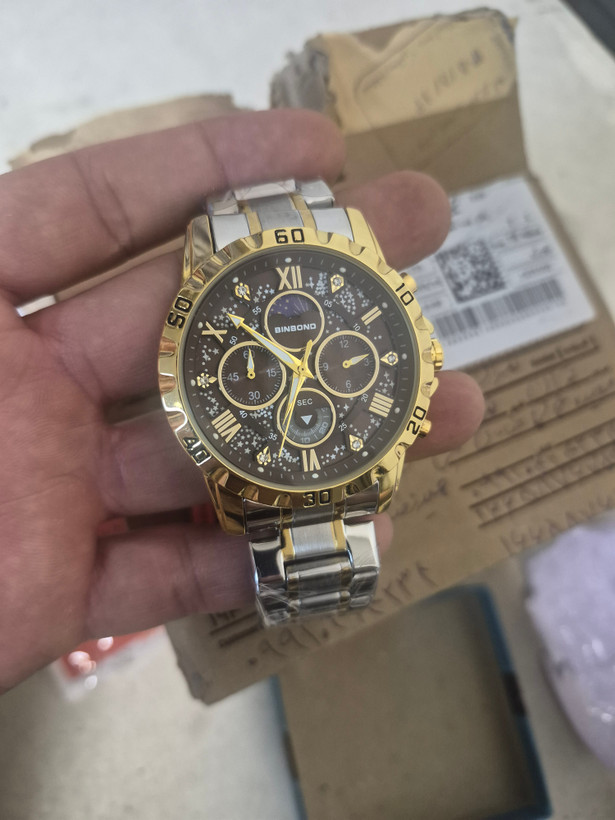 ☑️BIN BOND VIP Original watch 《highe quality》 بین باند الماسی نو نمایش روز ماه صفحه کهکشانی شب نما برند شرکتی دارای روز شمار کرنوگراف بندفولادی ضد زنگ مقاوم دربرابر آب رنگ ثابت قفل کلیپسی موتور کوارتز شرکتی خاص وجذاب