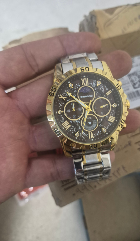 ☑️BIN BOND VIP Original watch 《highe quality》 بین باند الماسی نو نمایش روز ماه صفحه کهکشانی شب نما برند شرکتی دارای روز شمار کرنوگراف بندفولادی ضد زنگ مقاوم دربرابر آب رنگ ثابت قفل کلیپسی موتور کوارتز شرکتی خاص وجذاب