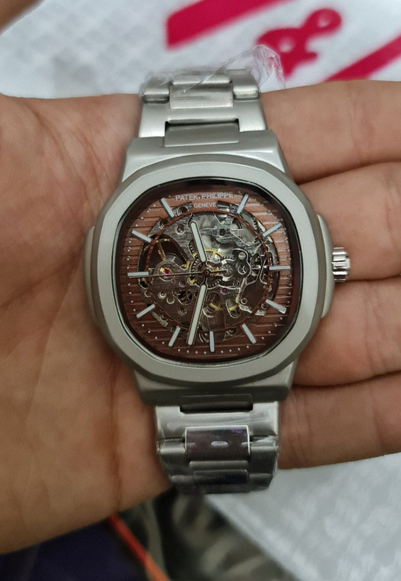 PATEK PHILIPPE ORIGINAL AUTOMATIC اتومات موتور ژاپن پشت شیشه ای قاب استیل قفل پروانه ای دارای شماتیک وضعیت بند استیل رنگ ثابت یا چرم اصلی شارژ گیری سریع با حرکت دست